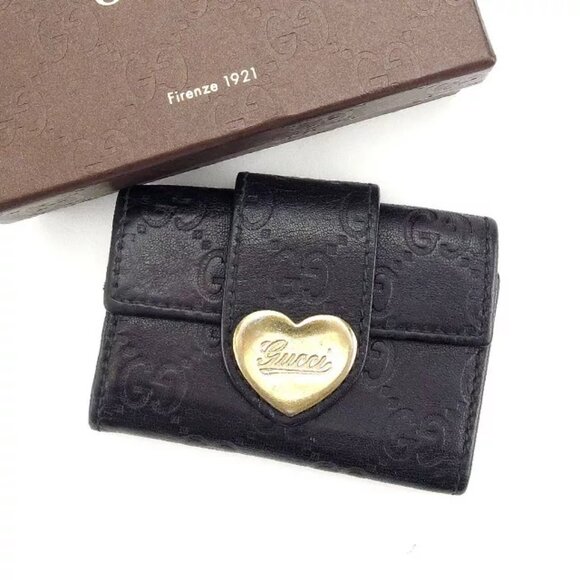 AUTHENTICITY GUARANTEED Gucci Key holder Key case Guccissima Black Gold Woman - Picture 1 of 5